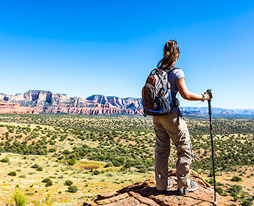 Woman Hiker Taking in Scenic View